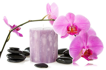 Image showing orchid,aromatic candle and black stones 