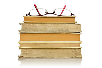 Image showing stack of books with glasses 