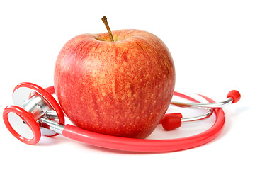 Image showing red apple and stethoscope