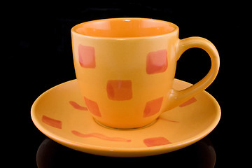 Image showing coffee cup over a black background