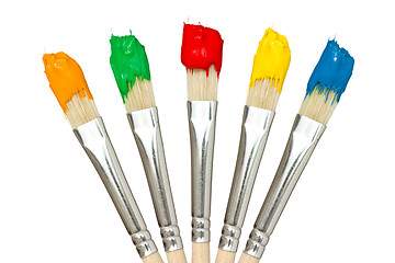 Image showing Five paintbrushes with color paints