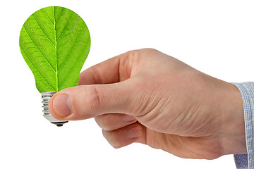 Image showing Hand with eco green energy light bulb