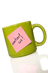 Image showing green cup with note 