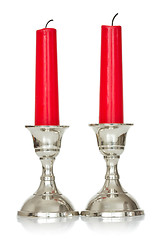 Image showing  Two red candles on white background
