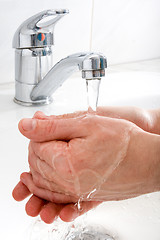 Image showing washing hands