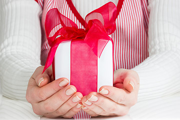 Image showing Woman showing  gift