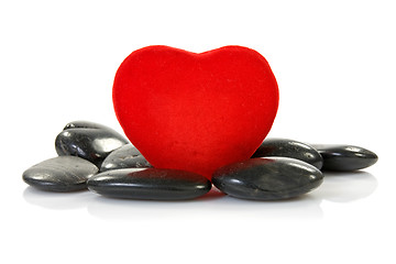 Image showing red heart with black stones