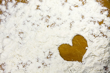 Image showing heart shape in a flour 