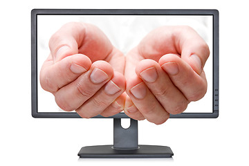 Image showing Computer monitor with open palms