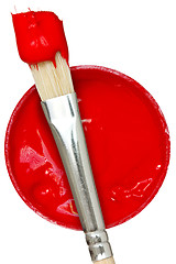 Image showing Red paint with paintbrush