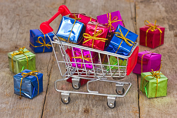 Image showing Cart with colorful gift boxes