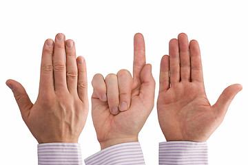 Image showing three hands expressing different symbols