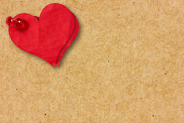 Image showing Paper hearts pinned to the  cardboard