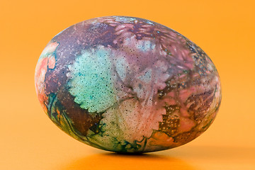 Image showing ornate easter egg, isolated on orange background