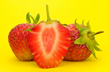 Image showing strawberries on yellow background