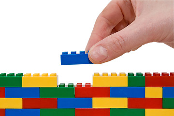 Image showing hand building lego