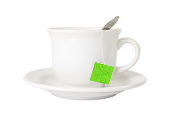 Image showing white tea cup with green leaf label