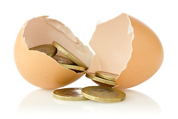 Image showing Broken  eggs with coins 