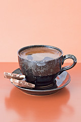 Image showing coffee with two chocolate pieces