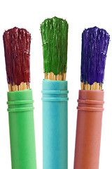 Image showing three paintbrushes with color paint