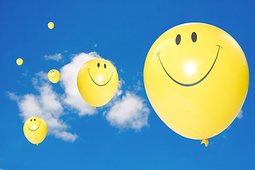 Image showing yellow flying balloons