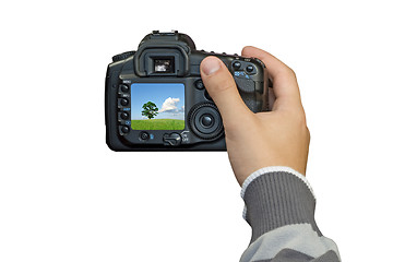 Image showing hand with digital photo camera