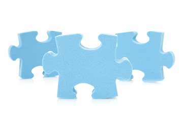 Image showing three blue  puzzle pieces