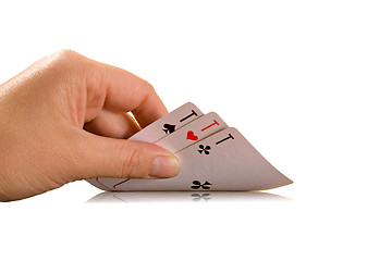 Image showing hand holding three playing cards