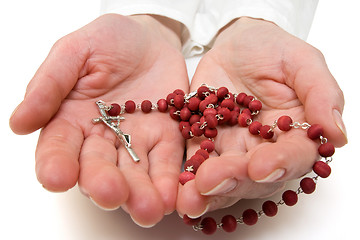 Image showing rosary in the woman hands