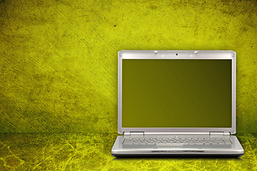 Image showing computer on green and dirty background