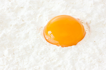 Image showing flour with egg yolk