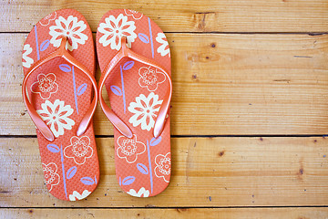 Image showing flip flops on the wooden floor