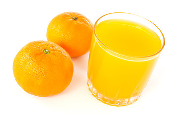 Image showing mandarines and juice glass 