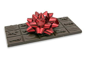 Image showing dark chocolate with red bow