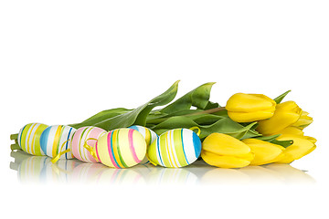 Image showing Yellow tulips and Easter eggs