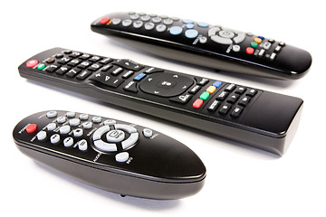 Image showing three remote controls 