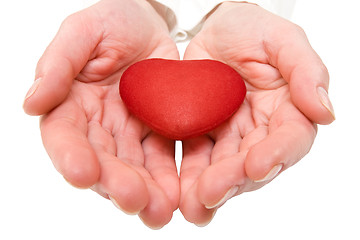 Image showing red heart in a woman hands