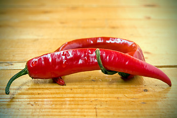 Image showing red Chili peppers on the floor