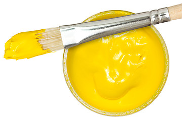 Image showing Yellow paint with paintbrush