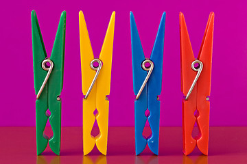 Image showing four colorful clothespins