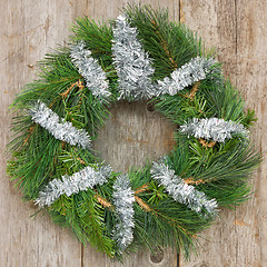 Image showing Christmas wreath hung on the wall