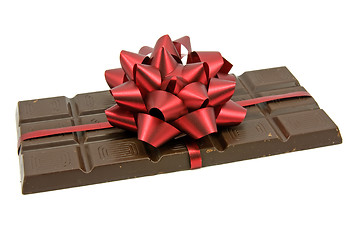 Image showing Chocolate with red ribbon