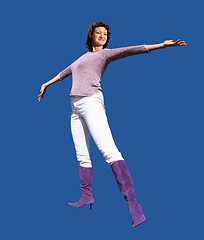 Image showing Happy woman on blue background