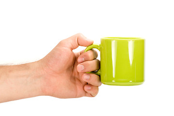 Image showing Hand with green cup 