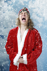 Image showing Happy screaming Santa and snowfall