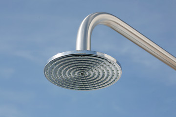 Image showing close up on head shower in a blue sky