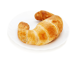 Image showing fresh and tasty croissant isolated on white background