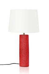Image showing red table lamp isolated on a white background