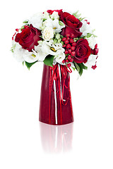 Image showing colorful flower bouquet arrangement centerpiece in red vase isol