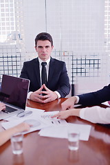 Image showing business woman with her staff in background at office